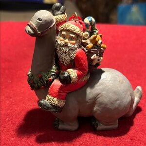 Vintage Santa on Dinosaur Ornament artist Sarah hill